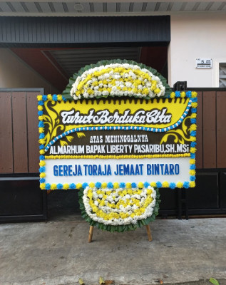 Papan Bunga Duka di Caturanom